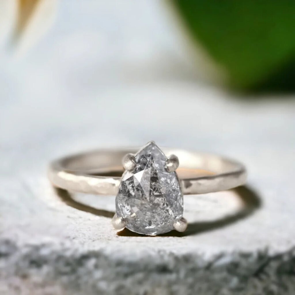 Pear Cut Salt And Pepper Diamond Ring With Hammered Band Design